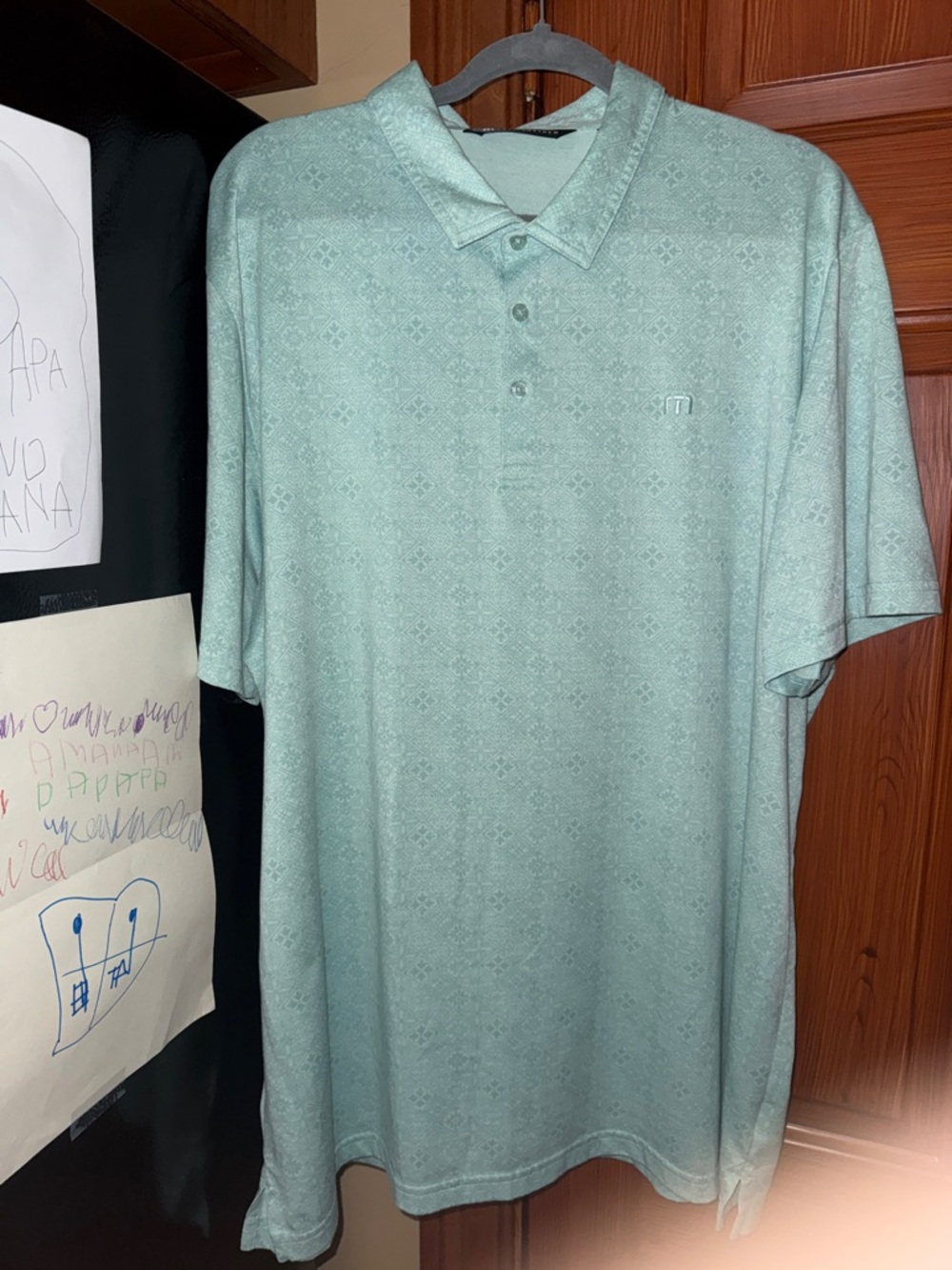 TravisMathew Men's Mint Green Polo with Subtle Pattern